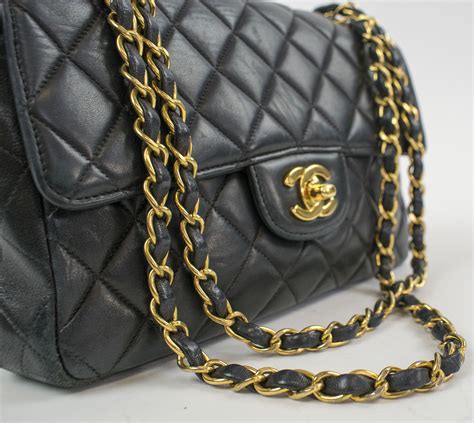 chanel bag black and gold chain